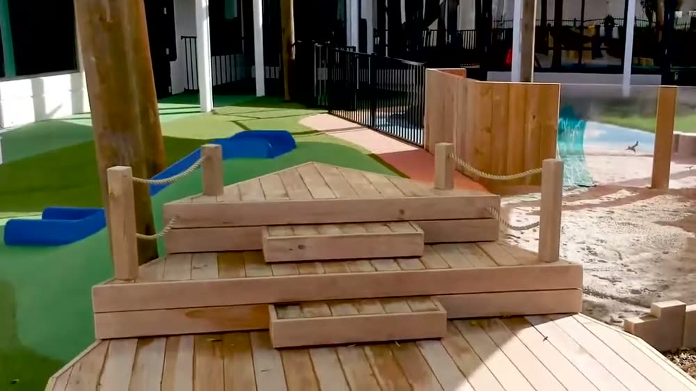 Timber blocks beside the sand play area outside