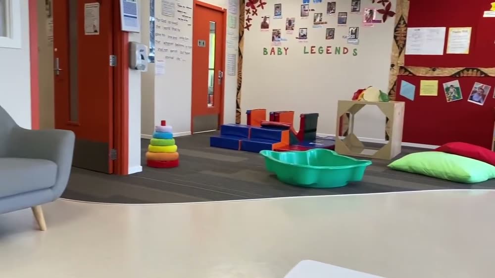 The Legends room with soft play shapes and a reading corner